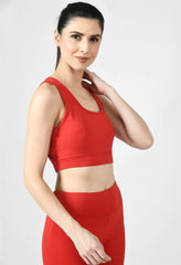 Model showcasing the comfortable fit of Waylene's red sports bra