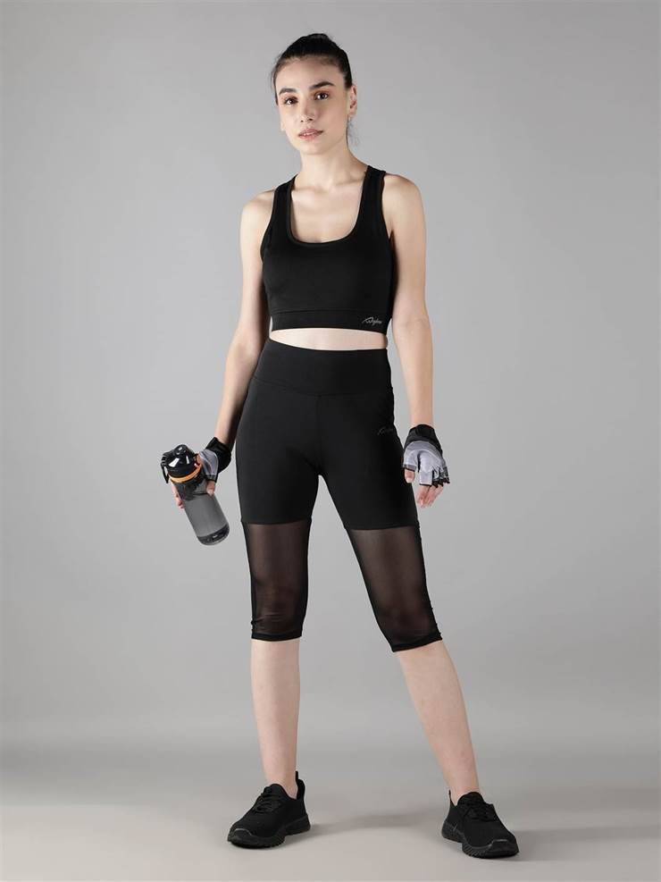 Waylene Women's Black Track Suit with Capri Tights, front view with water bottle