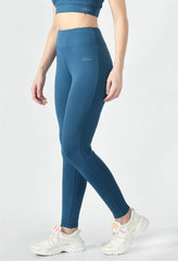 Waylene Teal Blue Yoga Leggings, angled side view emphasizing slim-fit and stretch.