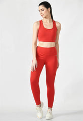 Waylene Women's Red Track Suit showcasing a sporty design with a crop top and leggings.