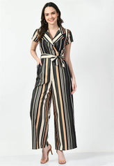 Waylene's striped multi-color collared jumpsuit featuring a v-neckline, short sleeves, and a tie waist. Model stands smiling in a neutral pose on a white background.