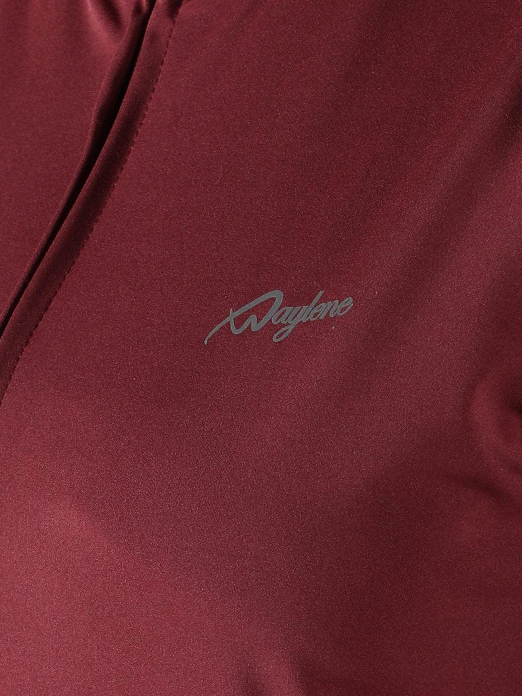 Close-up of Waylene logo on wine color sweatshirt, showcasing fabric texture.