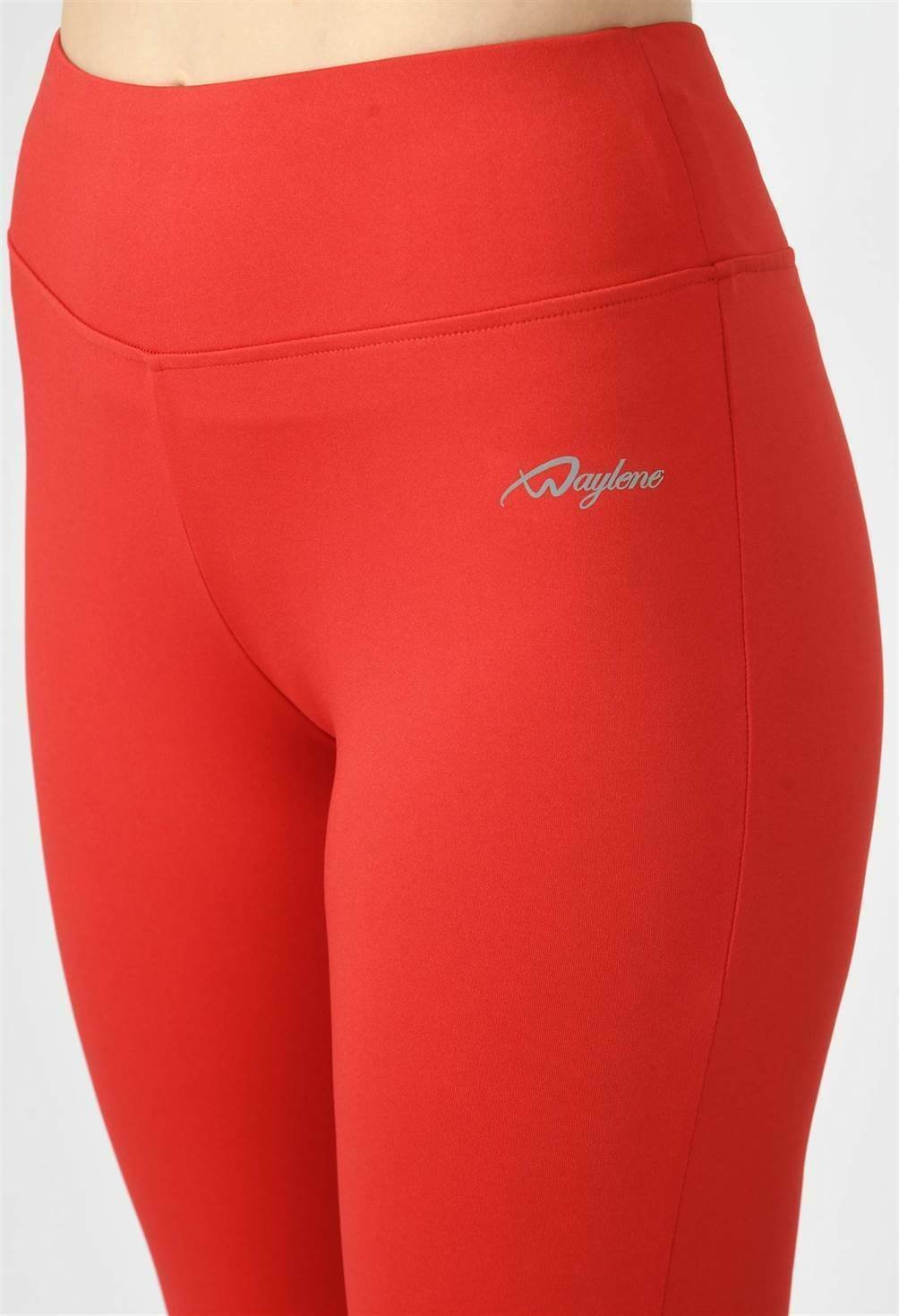 Close-up of Waylene Women's Red Track Suit leggings with brand logo detail.