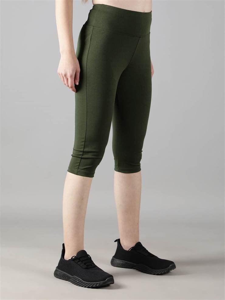 Waylene Olive Green Capri Tights angled view showcasing comfortable stretch fabric.