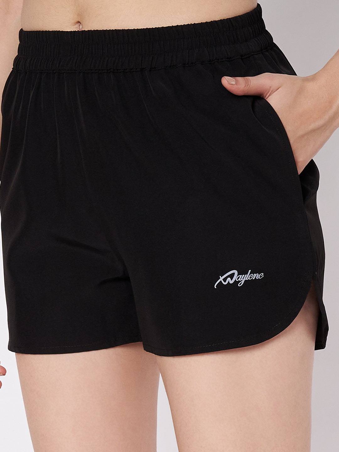 Waylene Black Polyester Shorts close-up displaying side pocket and subtle logo embroidery.